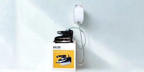 Compact bottle-style steam iron for precision work and detailed ironing tasks